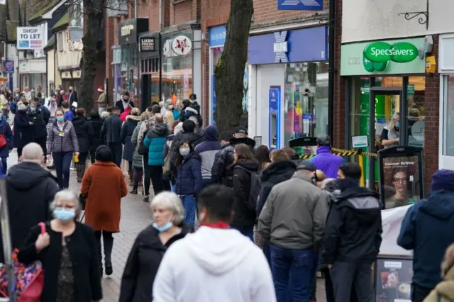 Image shows high street shoppers