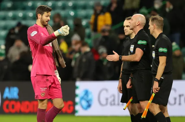 Hearts captain Craig Gordon in conversation with the match officials