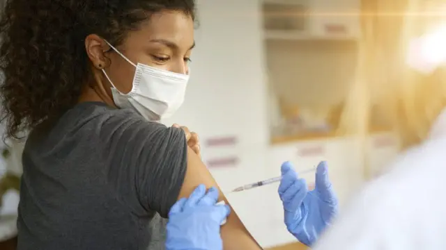 Woman getting a jab