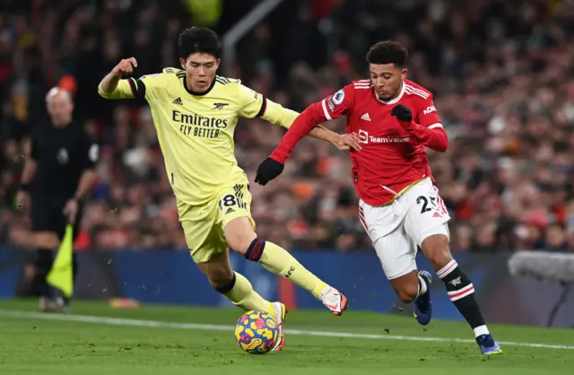 Jadon Sancho attacks