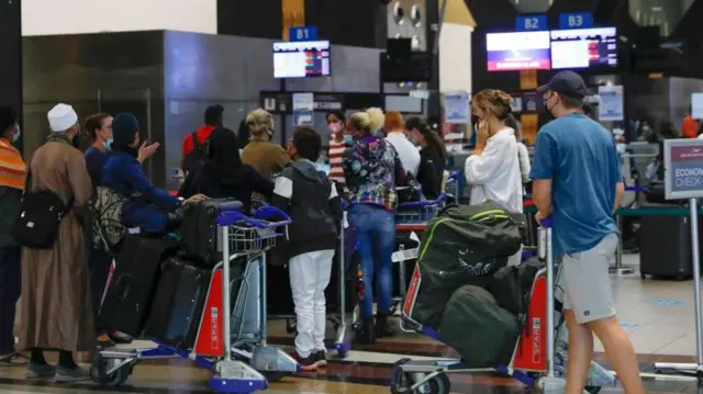 Travellers at OR Tambo International Airport in Johannesburg