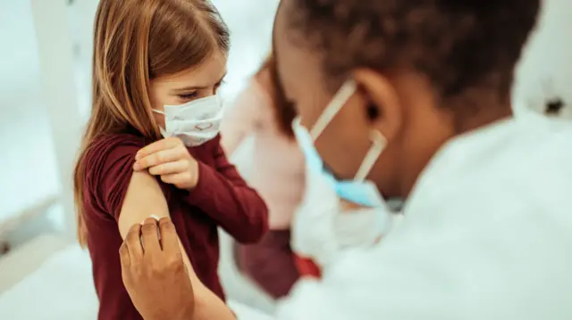 Little girl getting vaccinated