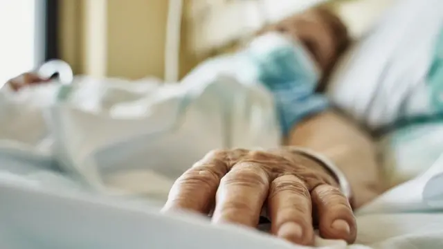 A patient in a hospital bed