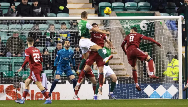 Ryan Porteous scores the first goal of the Shaun Maloney era and heads Hibernian into the lead