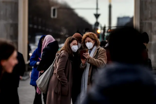 People wear face masks in Berlin