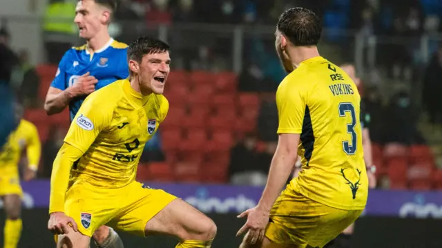 Ross Callachan and Jake Vokins (left to right) celebrate Ross County's winning goal