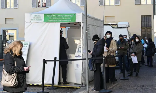 People queue for Covid tests in Italy