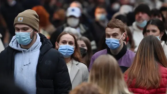 Christmas shoppers wearing face masks