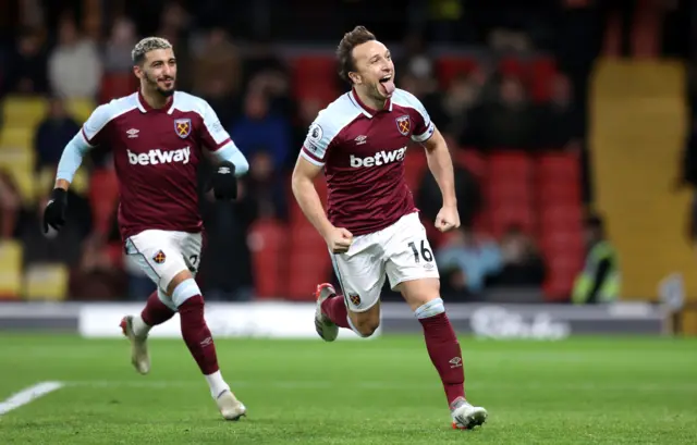 Mark Noble celebrates.