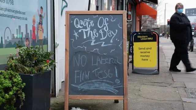 Sign outside a pharmacy saying no lateral flow tests available