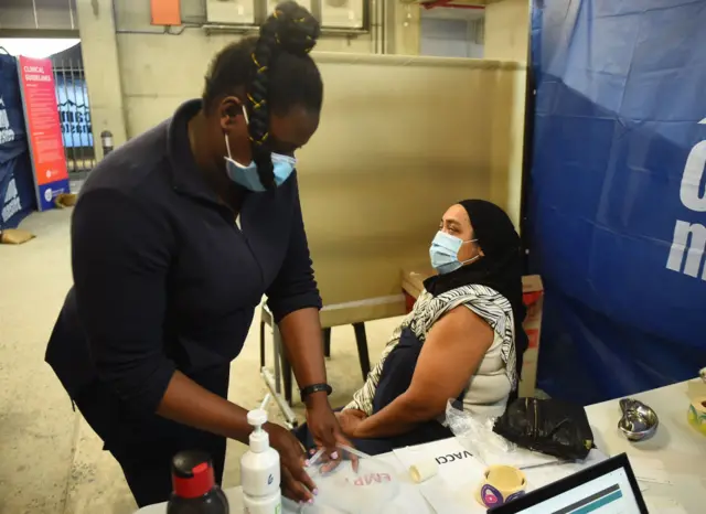 Woman receives a Covid vaccine in Cape Town, South Africa