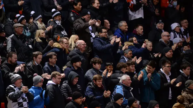 Clapping Gateshead fans