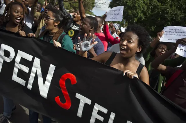 South African students protesting with a banner