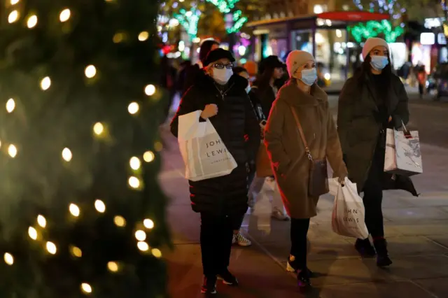 Shoppers wearing masks