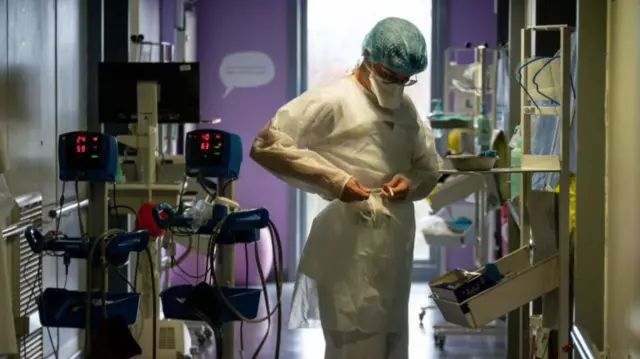 A medical staff works in the pulmonology department of the Nouvel Hopital Civil (NHC) in Strasbourg, eastern France, on December 2, 2021