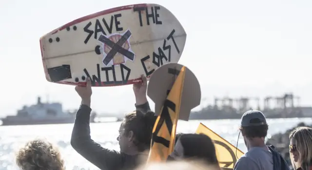 Protesters against the planned Shell seismic survey for oil and gas in the ocean on November 21, 2021 in Cape Town, South Africa.