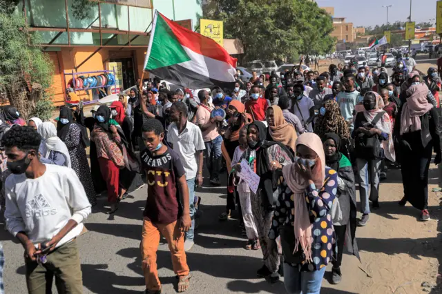 People march during a demonstration in the centre of Sudan's capital Khartoum on 30 November