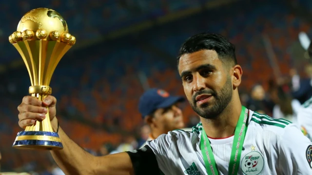 Algeria forward Riyad Mahrez with the Africa Cup of Nations trophy