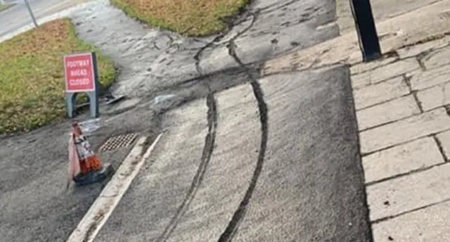 Wheel marks in tarmac