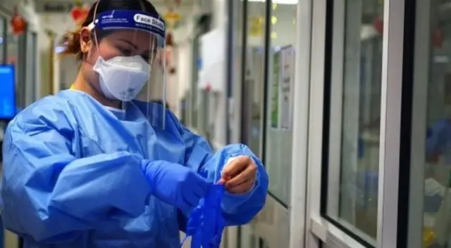 NHS worker in PPE