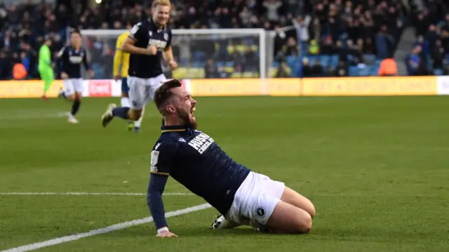 Tom Bradshaw celebrates