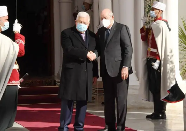 Palestinian President Mahmoud Abbas is being welcomed by President of Algeria, Abdelmadjid Tebboune in Algiers, Algeria on December 06, 2021