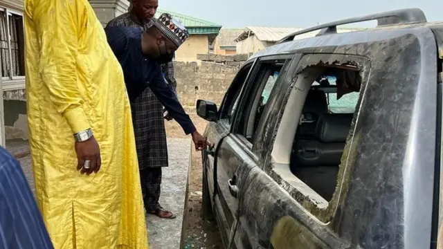 People by car in which bodies of children were found