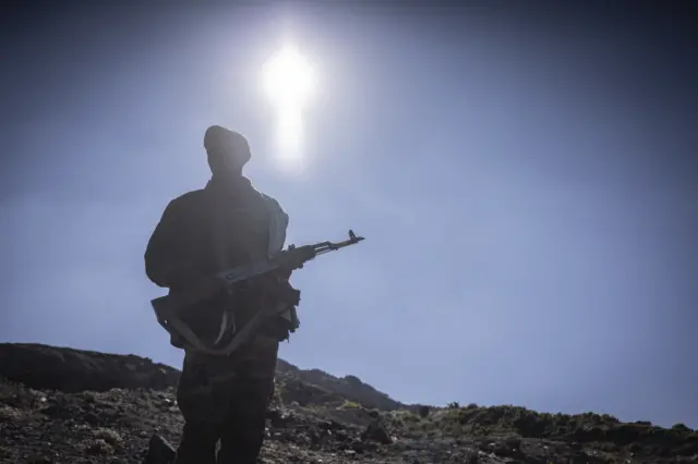 An Amhara militiaman looks on in Mehal Meda, Ethiopia, on 6 December 2021.