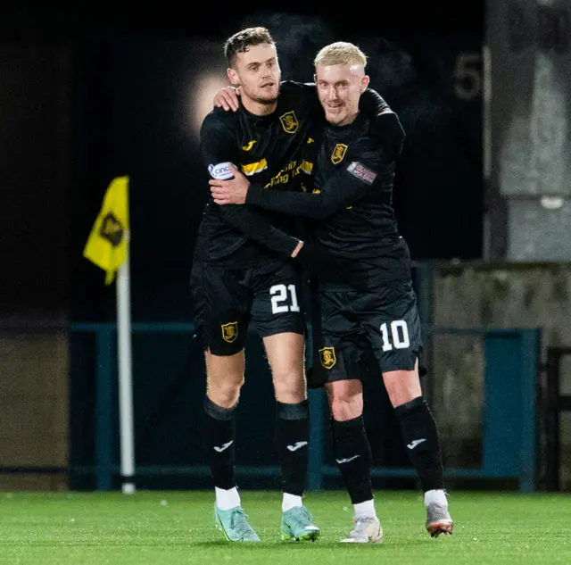 Jack McMillan (left) celebrates scoring for Livingston