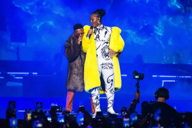 Wizkid and Tems on stage in London in December 2021.