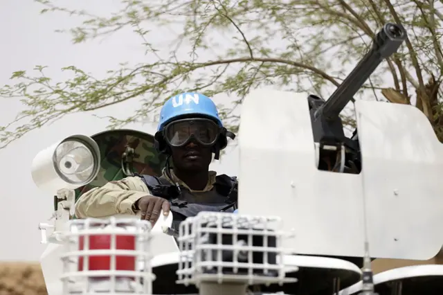 United Nations (UN) soldiers patrol on July 27, 2013 in the northern Malian city of Kidal.