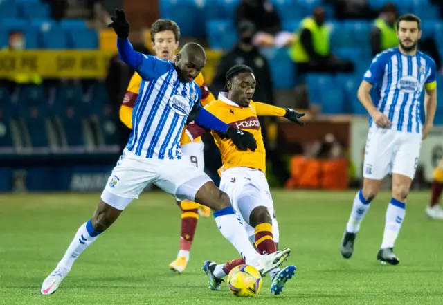 Kilmarnock's Clevid Dikamona and Devante Cole of Motherwell