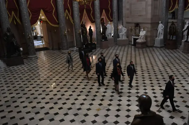 House impeachment managers walk to the Senate floor as they arrive for the start of the trial of former US President Donald Trump on Capitol Hill on February 9, 2021,