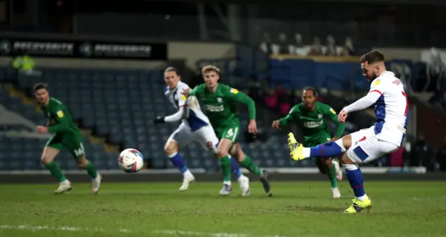 Adam Armstrong scores a penalty