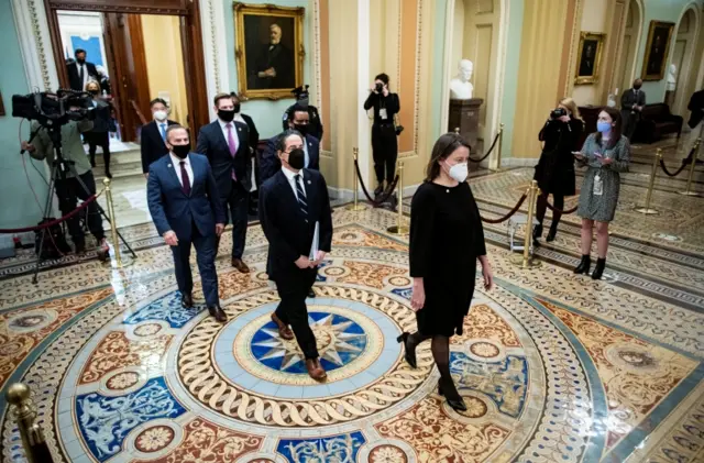 Democratic House managers left the Senate chamber for the last time