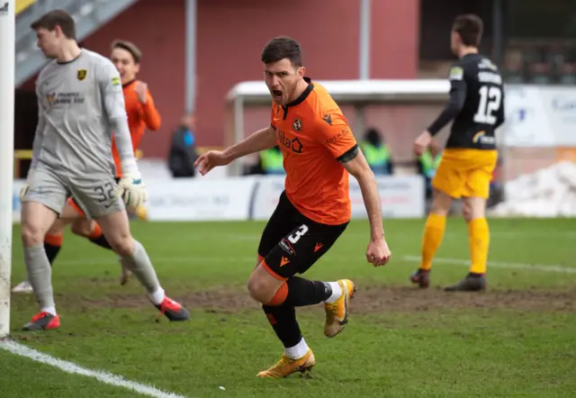 Adrian Sporle celebrates his early goal for Dundee United