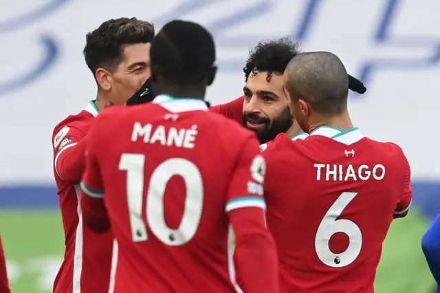 Liverpool celebrate Mo Salah's opener