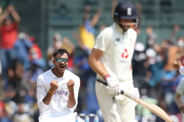 Axar Patel and Joe Root