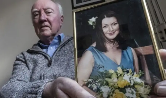 Peter Lawrence with picture of Claudia Lawrence