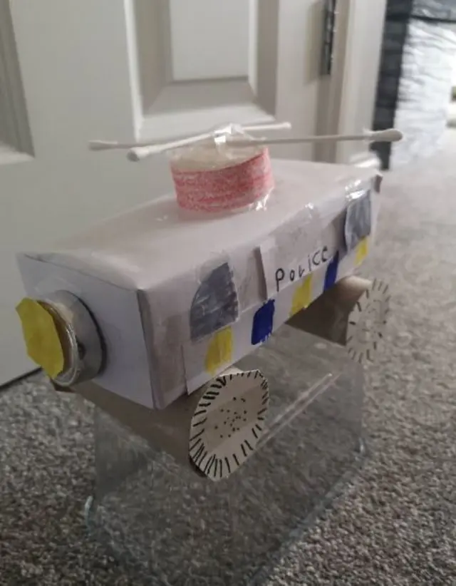 Childs model police car with helicopter blades of cotton buds