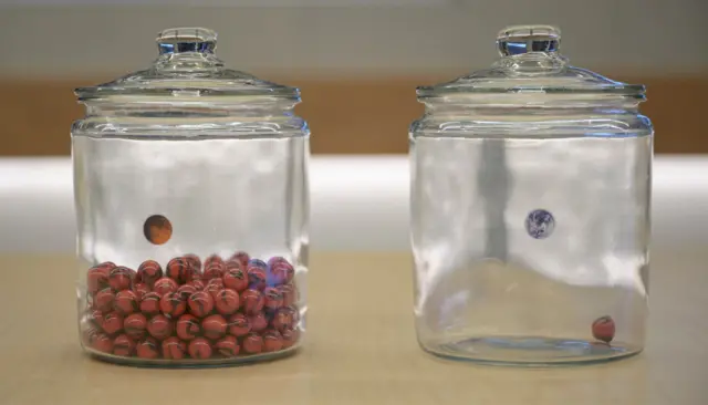 Marbles in two jars