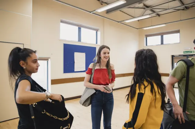 Generic image of teenagers gathering at a youth centre