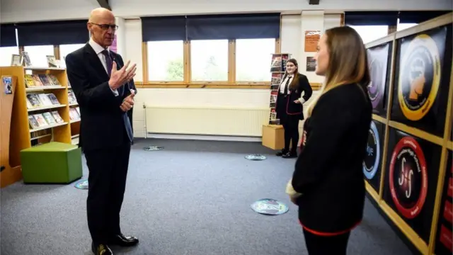The education secretary visited a school in Rutherglen on results day last August