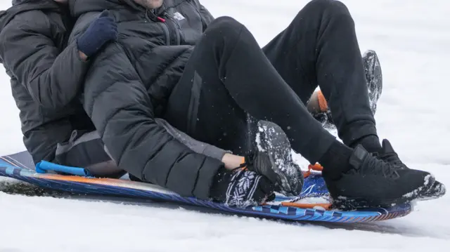 A generic photo of a person sledging