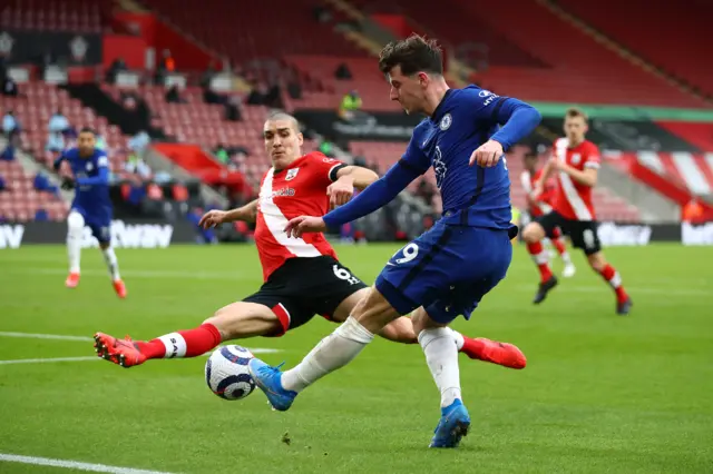 Oriol Romeu of Southampton attempts to block the cross of Mason Mount