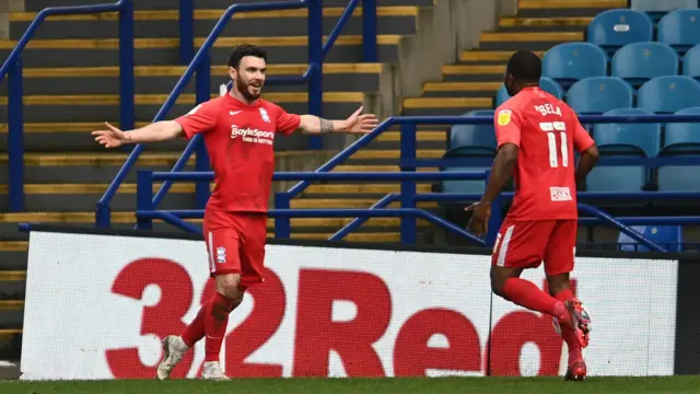 Scott Hogan celebrates