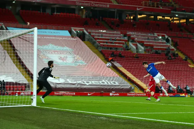 Alisson Becker of Liverpool saves from Seamus Coleman