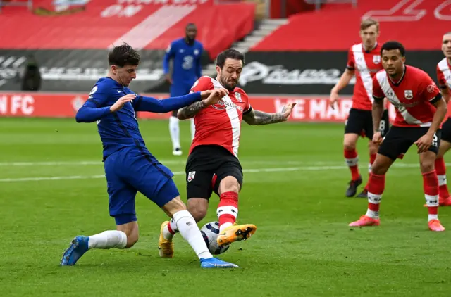 Mason Mount of Chelsea is fouled by Danny Ings