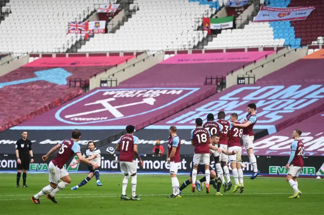 Harry Kane takes a free-kick