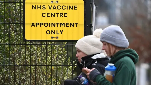 People outside a vaccination centre
